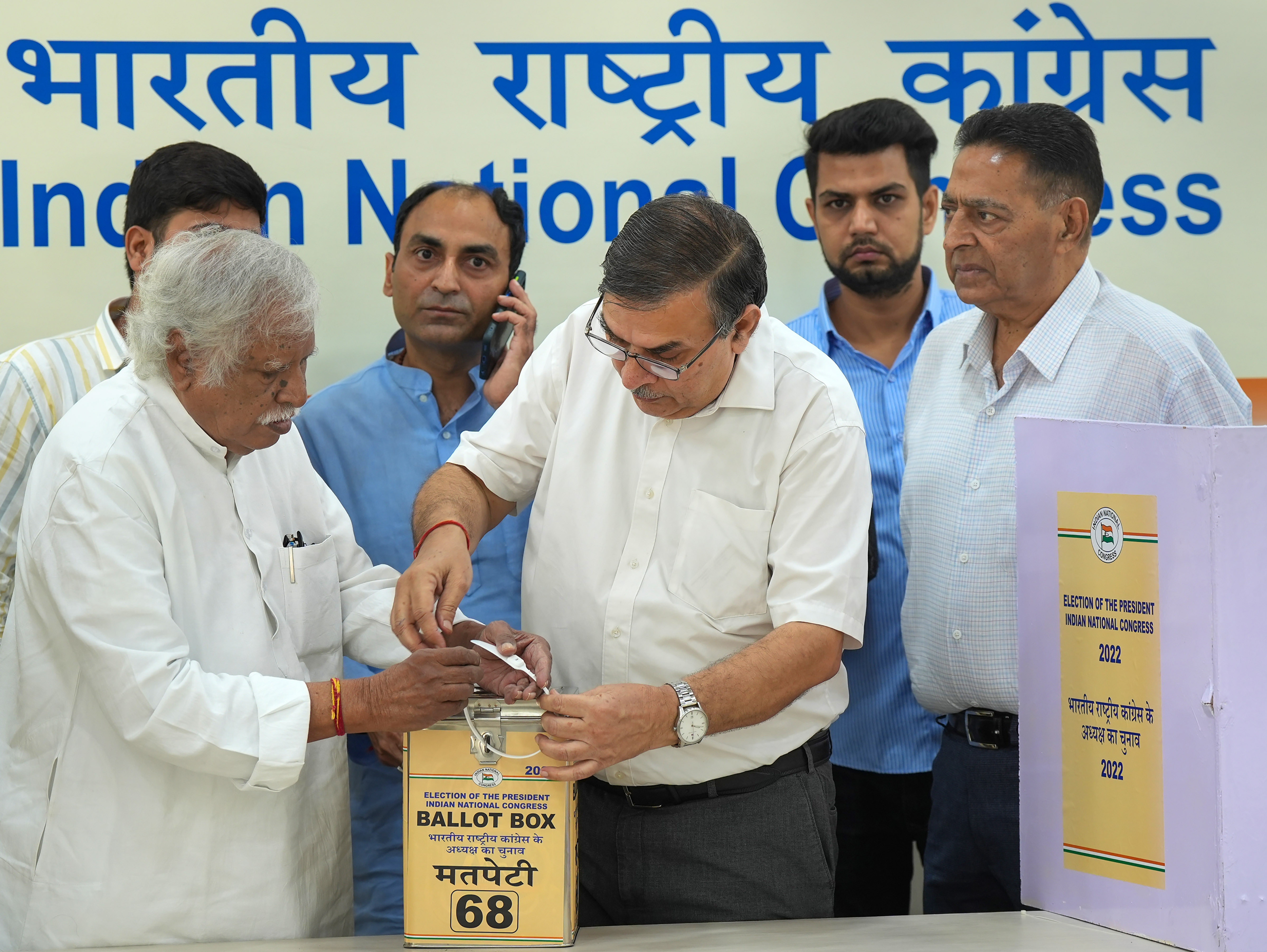 Congress' central election authority chairman Madhusudan Mistry with other poll officials seal a ballot box before the start of voting on Monday. (PTI) Congress' central election authority chairman Madhusudan Mistry with other poll officials seal a ballot box before the start of voting on Monday. (PTI)