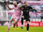  Inter Miami forward Gonzalo Higuain (10) and CF Montreal defender Joel Waterman (16) battle for the ball (USA TODAY Sports)