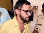 Delhi police officials with former JNU student Umar Khalid. Delhi police officials with former JNU student Umar Khalid.