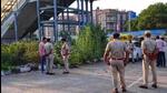 Police at the crime scene near Iffco Chowk in Gurugram. (HT Photo) Police at the crime scene near Iffco Chowk in Gurugram. (HT Photo)