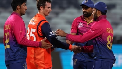 Netherlands' Scott Edwards, second left, shakes hands wth UAE's Chundangapoyil Rizwan (AP) Netherlands' Scott Edwards, second left, shakes hands wth UAE's Chundangapoyil Rizwan (AP)