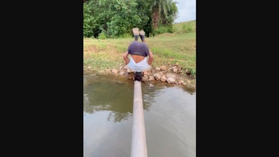 Taken from the Instagram video, the image shows the man losing his balance while trying to backflip on a pipe. (Instagram/@_kunalkushwaha)