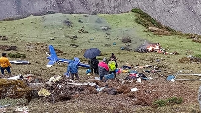 Kedarnath: Locals at the site after a helicopter carrying pilgrims crashed near Kedarnath in Uttarakhand, (PTI) Kedarnath: Locals at the site after a helicopter carrying pilgrims crashed near Kedarnath in Uttarakhand, (PTI)