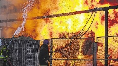 Firefighters work to put out a fire in a thermal power plant, damaged by a Russian missile strike in Kyiv, Ukraine, on Tuesday. (REUTERS) Firefighters work to put out a fire in a thermal power plant, damaged by a Russian missile strike in Kyiv, Ukraine, on Tuesday. (REUTERS)