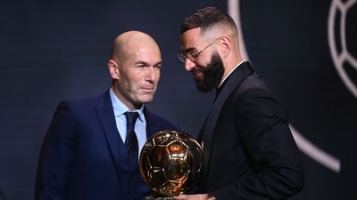 Real Madrid's French forward Karim Benzema receives the Ballon d'Or award. (AFP)