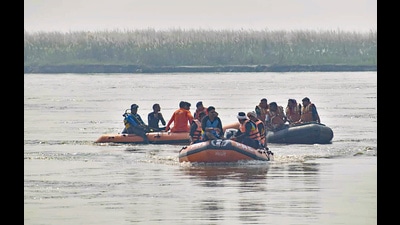 Rescue operation underway after a boat capsized in the Ganga river, at Hastinapur area in Meerut district on Tuesday. (PTI)