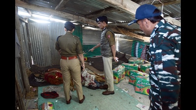 Kashmir, additional director general of police (ADGP) Vijay Kumar inspects the rented accommodation of two non-local labourers who were killed in a grenade attack in Shopian on Tuesday. (ANI)