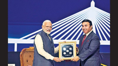 Prime Minister Narendra Modi with INTERPOL President Ahmed Naser Al-Raisi releases commemorative coins of ₹100 denomination during the 90th General Assembly of INTERPOL, at Pragati Maidan in New Delhi, Tuesday (PTI) Prime Minister Narendra Modi with INTERPOL President Ahmed Naser Al-Raisi releases commemorative coins of ₹100 denomination during the 90th General Assembly of INTERPOL, at Pragati Maidan in New Delhi, Tuesday (PTI)