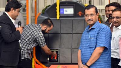 New Delhi, India – October 18, 2022: Delhi Chief Minister Arvind Kejriwal seen inaugurating one of the eleven new Electric Vehicle (EV) charging cum swapping stations under the ‘Switch Delhi’ scheme at the Indraprastha metro station, in New Delhi, India, on Tuesday, October 18, 2022. (Photo by Sanjeev Verma/ Hindustan Times) (Hindustan Times) New Delhi, India – October 18, 2022: Delhi Chief Minister Arvind Kejriwal seen inaugurating one of the eleven new Electric Vehicle (EV) charging cum swapping stations under the ‘Switch Delhi’ scheme at the Indraprastha metro station, in New Delhi, India, on Tuesday, October 18, 2022. (Photo by Sanjeev Verma/ Hindustan Times) (Hindustan Times)