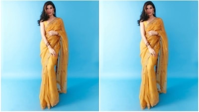 For accessories, Jacqueline chose matching high heels, sleek bracelets, emerald and stone-adorned rings, and statement jhumkis. Side-parted open wavy tresses completed her hairstyle with the traditional look. (Instagram) For accessories, Jacqueline chose matching high heels, sleek bracelets, emerald and stone-adorned rings, and statement jhumkis. Side-parted open wavy tresses completed her hairstyle with the traditional look. (Instagram)