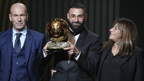 Real Madrid's Karim Benzema celebrates after winning the 2022 Ballon d'Or trophy&nbsp;
