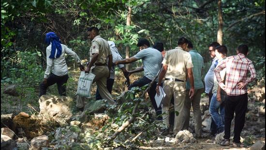 A joint team of Rajasthan and Delhi Police recovered bodies of two children from a wooded area near the Qutub Minar Metro station. The two boys, and another of their sibling, were abducted from Rajasthan. (Raj K Raj/HT Photo)