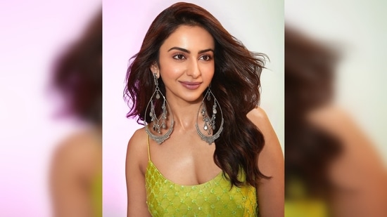 Rakul Preet's outfit comprises a short strappy kurta, a sharara and a matching sheer dupatta.(Instagram/@rakulpreet)