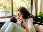 Kajal Aggarwal continues to cover son Neil's face, days after revealing it at an airport. Kajal Aggarwal continues to cover son Neil's face, days after revealing it at an airport.