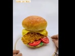 Artist made embroidery burger.(Instagram/@embroiderycode) Artist made embroidery burger.(Instagram/@embroiderycode)