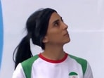 Iranian climber Elnaz Rekabi competing at an international tournament without hijab.