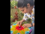 The image shows the woman making rangoli for Diwali using nails and threads.(Instagram/@craftsbazaar) The image shows the woman making rangoli for Diwali using nails and threads.(Instagram/@craftsbazaar)