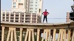 Man on top of Grant Road skywalk causes chaos, traffic jam Man on top of Grant Road skywalk causes chaos, traffic jam