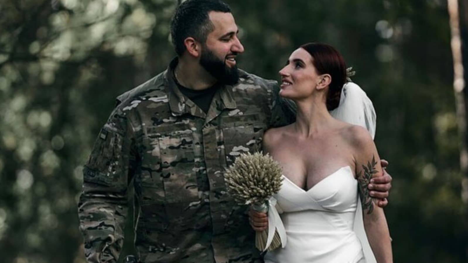 Love in war: Ukrainian sniper marries soldier she met during war
