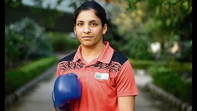 Punjab’s boxer Simranjit Kaur Baatth won gold in the women’s lightweight finals at the recent National Games. Punjab’s boxer Simranjit Kaur Baatth won gold in the women’s lightweight finals at the recent National Games.