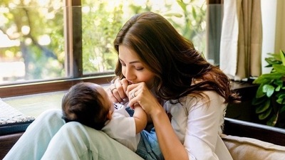Kajal Aggarwal continues to cover son Neil's face, days after revealing it at an airport.