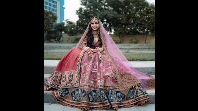 A bride is wearing a lehenga set by Marwar Couture rented on Flyrobe A bride is wearing a lehenga set by Marwar Couture rented on Flyrobe