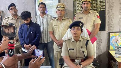 To make the job offers look credible, the suspect, identified as Shubham Singh (in blue jacket), used to meet all potential aspirants near the North and South Blocks in Lutyens’ Delhi. (HT Photo) To make the job offers look credible, the suspect, identified as Shubham Singh (in blue jacket), used to meet all potential aspirants near the North and South Blocks in Lutyens’ Delhi. (HT Photo)