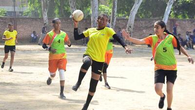 Players in action during handball match being held the Khedan Vatan Punjab Diyan at PAU Government School ground in Ludhiana. (Harvinder Singh/HT)