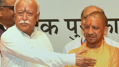 RSS chief Mohan Bhagwat with Uttar Pradesh chief minister Yogi Adityanath. (PTI File Photo)