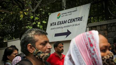 Parents of aspirants of the Common University Entrance Test (CUET) seen waiting outside the NTA Exam centre at North Campus, Delhi University in New Delhi, India, on Monday, August 8, 2022. (Hindustan Times) Parents of aspirants of the Common University Entrance Test (CUET) seen waiting outside the NTA Exam centre at North Campus, Delhi University in New Delhi, India, on Monday, August 8, 2022. (Hindustan Times)