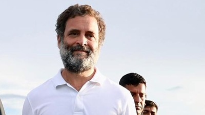 Congress leader Rahul Gandhi walks with a padayatri during the party's Bharat Jodo Yatra in Kurnool. (ANI Photo) Congress leader Rahul Gandhi walks with a padayatri during the party's Bharat Jodo Yatra in Kurnool. (ANI Photo)