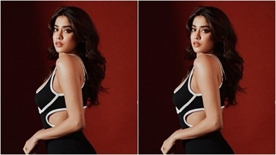 Janhvi posed for the cameras against a red backdrop and made her fans drool in the ensemble. (Instagram/@janhvikapoor) Janhvi posed for the cameras against a red backdrop and made her fans drool in the ensemble. (Instagram/@janhvikapoor)