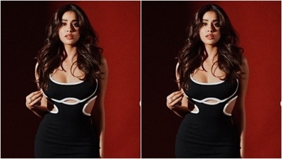 Janhvi decked up in a black bodycon dress with a plunging neckline and cut-put details around the waist, showing off her midriff. The sleeveless dress hugged her shape and showed off her curves perfectly. (Instagram/@janhvikapoor) Janhvi decked up in a black bodycon dress with a plunging neckline and cut-put details around the waist, showing off her midriff. The sleeveless dress hugged her shape and showed off her curves perfectly. (Instagram/@janhvikapoor)