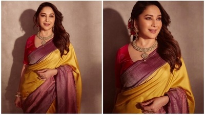 The gorgeous Madhuri Dixit has time and again proved she is the ultimate 'dhak dhak' girl. From traditional wear to fancy gowns, she can pull off any look effortlessly. The actor once again cast a spell on her fans with her latest timeless look in a traditional silk saree. (Instagram/@madhuridixitnene) The gorgeous Madhuri Dixit has time and again proved she is the ultimate 'dhak dhak' girl. From traditional wear to fancy gowns, she can pull off any look effortlessly. The actor once again cast a spell on her fans with her latest timeless look in a traditional silk saree. (Instagram/@madhuridixitnene)