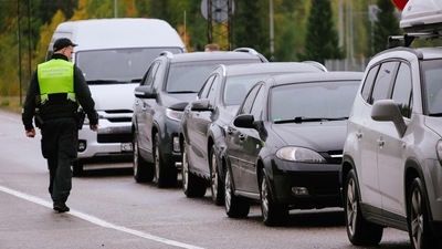 Russia-Ukraine War: A border guard officer controls the vehicles entering Finland at the border checkpoint crossing in Vaalimaa, Finland. (AFP) Russia-Ukraine War: A border guard officer controls the vehicles entering Finland at the border checkpoint crossing in Vaalimaa, Finland. (AFP)