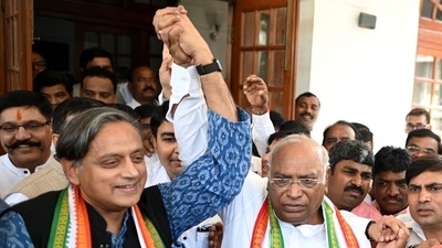 Congress leader Mallikarjun Kharge (centre) is congratulated by Shashi Tharoor after he got elected as the new Congress president, in New Delhi. (AFP) Congress leader Mallikarjun Kharge (centre) is congratulated by Shashi Tharoor after he got elected as the new Congress president, in New Delhi. (AFP)