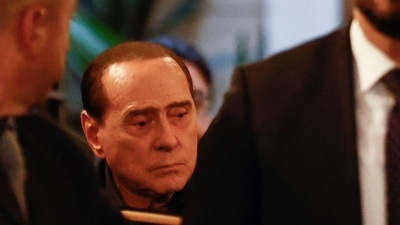 Silvio Berlusconi: Forza Italia leader and former Prime Minister Silvio Berlusconi leaves the Brothers of Italy party's headquarters in Rome, Italy. (Reuters)