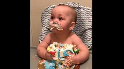 The image, taken from the Reddit video, shows the kid's way of eating a birthday cake. (Reddit/@downriverrowing)