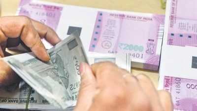 Rupee plunges 61 paise to dip below 83-mark for first time against dollar. (AFP) Rupee plunges 61 paise to dip below 83-mark for first time against dollar. (AFP)