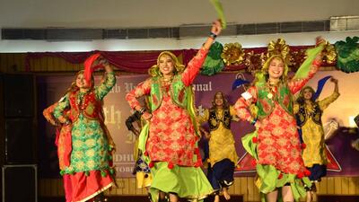 Students participating in a group dance during the PU Youth and Heritage festival at Ramgarhia College in Ludhiana. (Gurpreet Singh/HT)