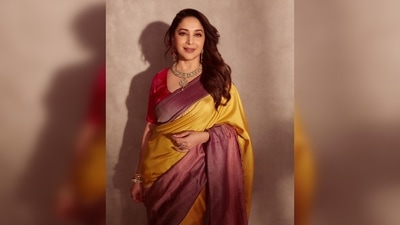 Madhuri Dixit, draped in a yellow silk saree, posed like the queen she already is. (Instagram/@madhuridixitnene) Madhuri Dixit, draped in a yellow silk saree, posed like the queen she already is. (Instagram/@madhuridixitnene)