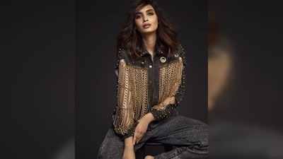 Diana Penty's denim jacket was no ordinary. It is a customised jacket featuring chains and spikes. She teamed it with a bralette and denim pants. (Instagram/@dianapenty) Diana Penty's denim jacket was no ordinary. It is a customised jacket featuring chains and spikes. She teamed it with a bralette and denim pants. (Instagram/@dianapenty)