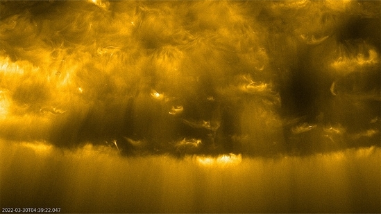 A new horizon: In February 2025, ESA’s Solar Orbiter will get a gravity assist from Venus and be flung into an inclined orbit around the Sun. It will repeat this move in December 2025, and from that supremely high latitude, it will finally be able to capture a first-ever top-down view of a polar region of the Sun. Until then, we must make do with this, a side view it took of the Sun’s south pole. The lighter areas are created by intersecting magnetic loops and the darker areas are where the Sun’s magnetic field lie open and radiation escapes to form solar wind.(Image Courtesy: ESA and NASA / Solar Orbiter / EUI Team)