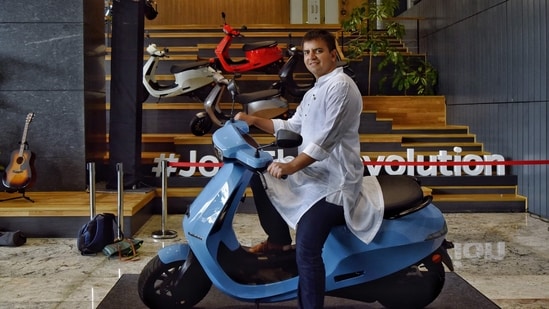 Bhavish Aggarwal, Co-founder and CEO of Ola, poses for a photograph with the new Ola electric scooter during its launch at the Ola headquarters in Bengaluru in this 2021 photo.