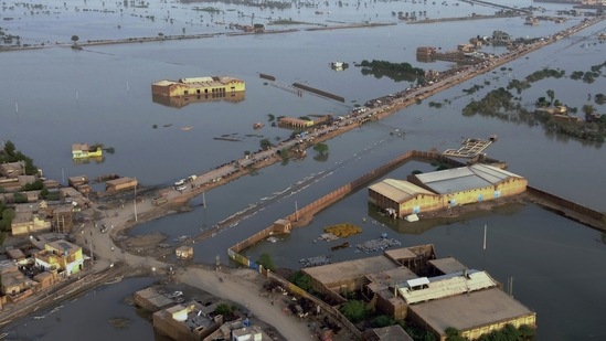 Pakistan Floods: Homes are surrounded by floodwaters in Sohbat Pur city, a district of Pakistan's southwestern Baluchistan province. (AP)
