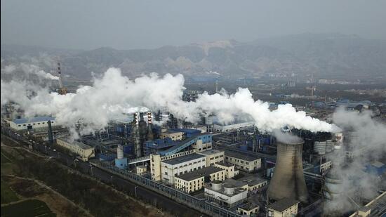 Smoke and steam rise from a coal processing plant in Hejin in central China’s Shanxi province. (AP/FILE)