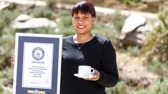 South African national Ingar Valentyn with her Guinness World Records title and a cup of tea. She achieved the feat after preparing 249 cups of tea in an hour. ( Guinness World Records) South African national Ingar Valentyn with her Guinness World Records title and a cup of tea. She achieved the feat after preparing 249 cups of tea in an hour. ( Guinness World Records)