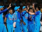 India's Bhuvneshwar Kumar celebrates with teammates