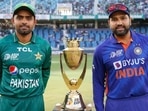 Pakistan captain Babar Azam and India skipper Rohit Sharma pose with Asia Cup.