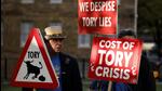 Demonstrators protest opposite parliament after Britain's Prime Minister Liz Truss resigned in London, on Thursday. (AP) Demonstrators protest opposite parliament after Britain's Prime Minister Liz Truss resigned in London, on Thursday. (AP)